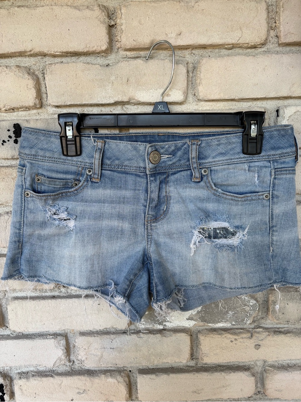 American Eagle Outfitters Light Blue Distressed Denim Shorts with glitter pocket